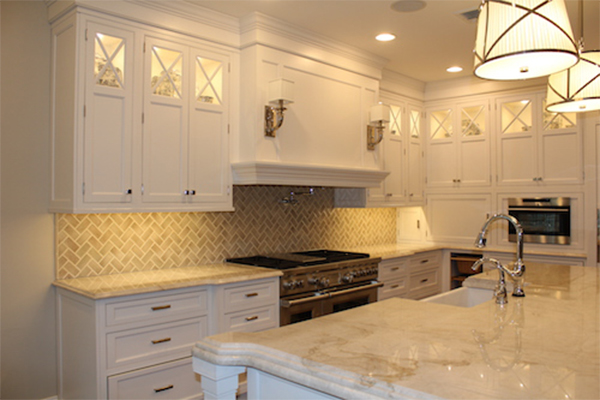 White Kitchen Cabinets and Wood Floor - K&B Home Solutions