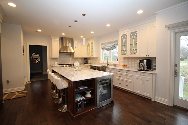 White Kitchen Cabinets with Patterned Backsplash - K&B Home Solutions