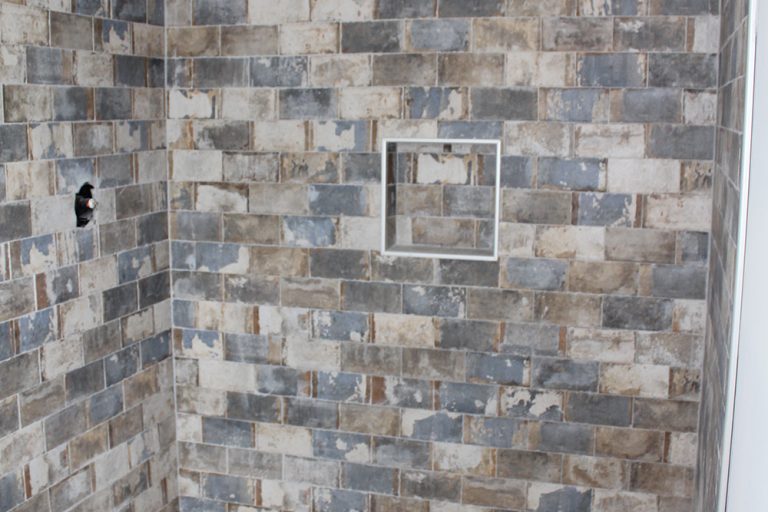 Natural Stone Tile and Porcelain Tile Combination in Bathroom